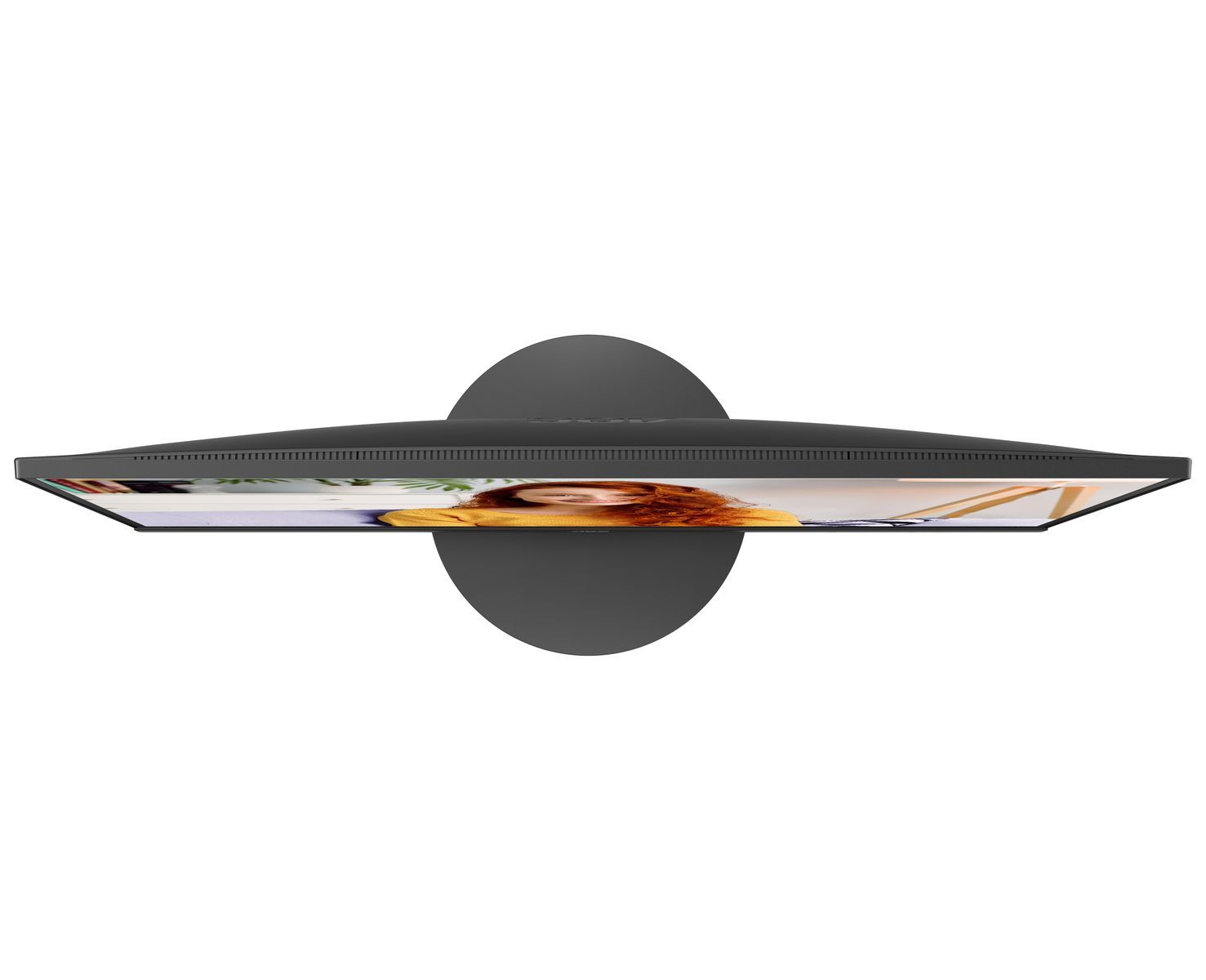 Slim black monitor with circular stand displaying vibrant image